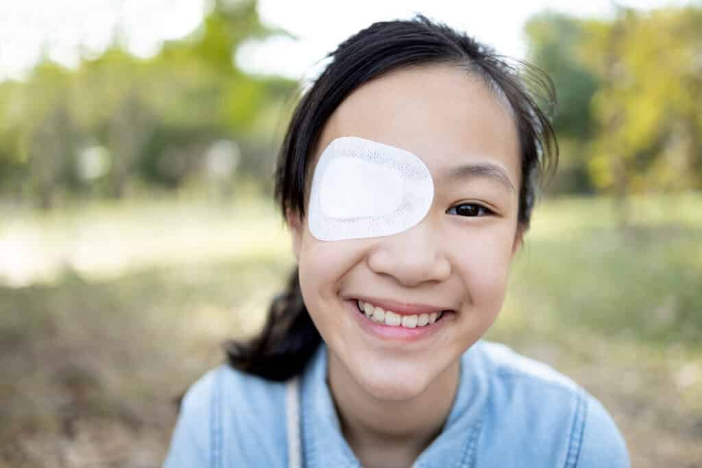 Child with an eye patch